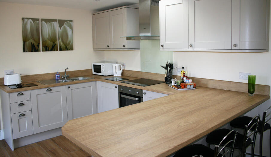 Fully equipped modern and stylish open plan kitchen